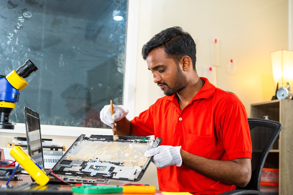 engineer working on circuit board