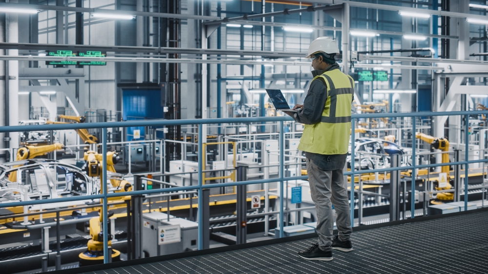 engineer overseeing robotics facility